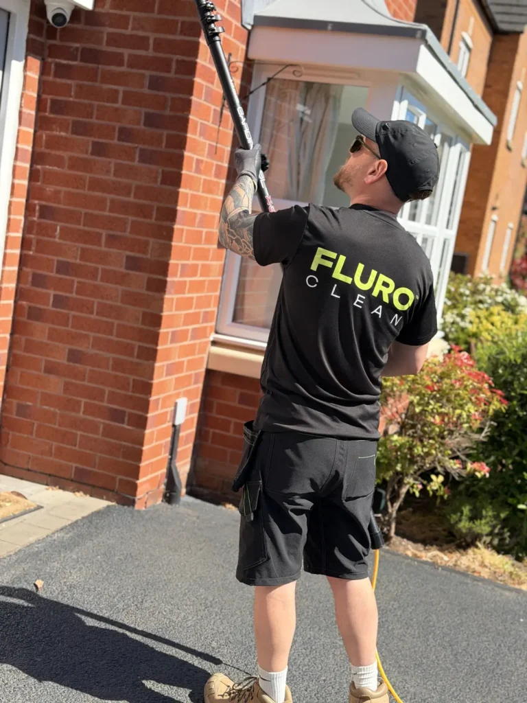 Matthew Field carrying out window cleaning services